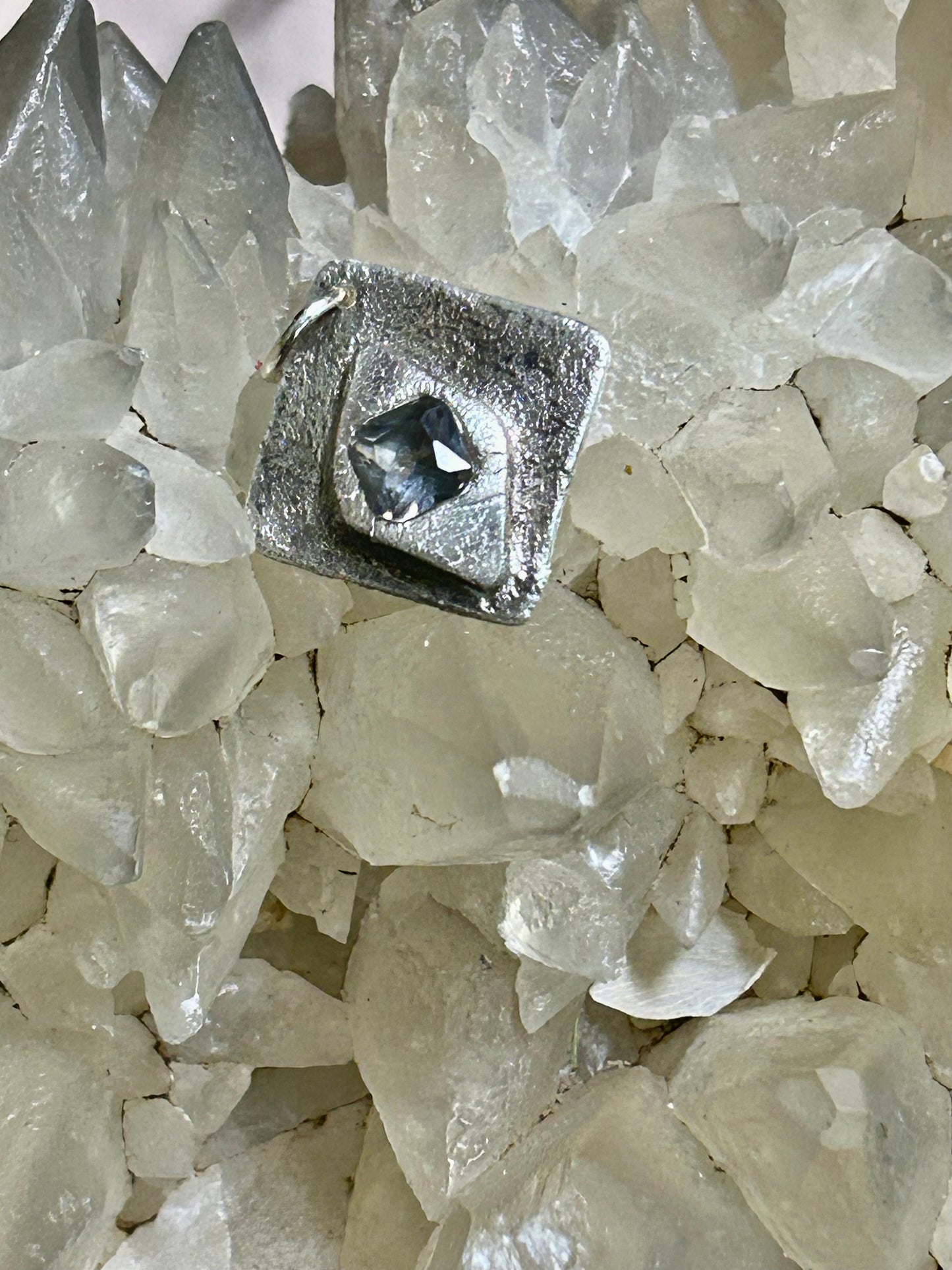 Fine Silver Pendant with Faceted Blue Stone