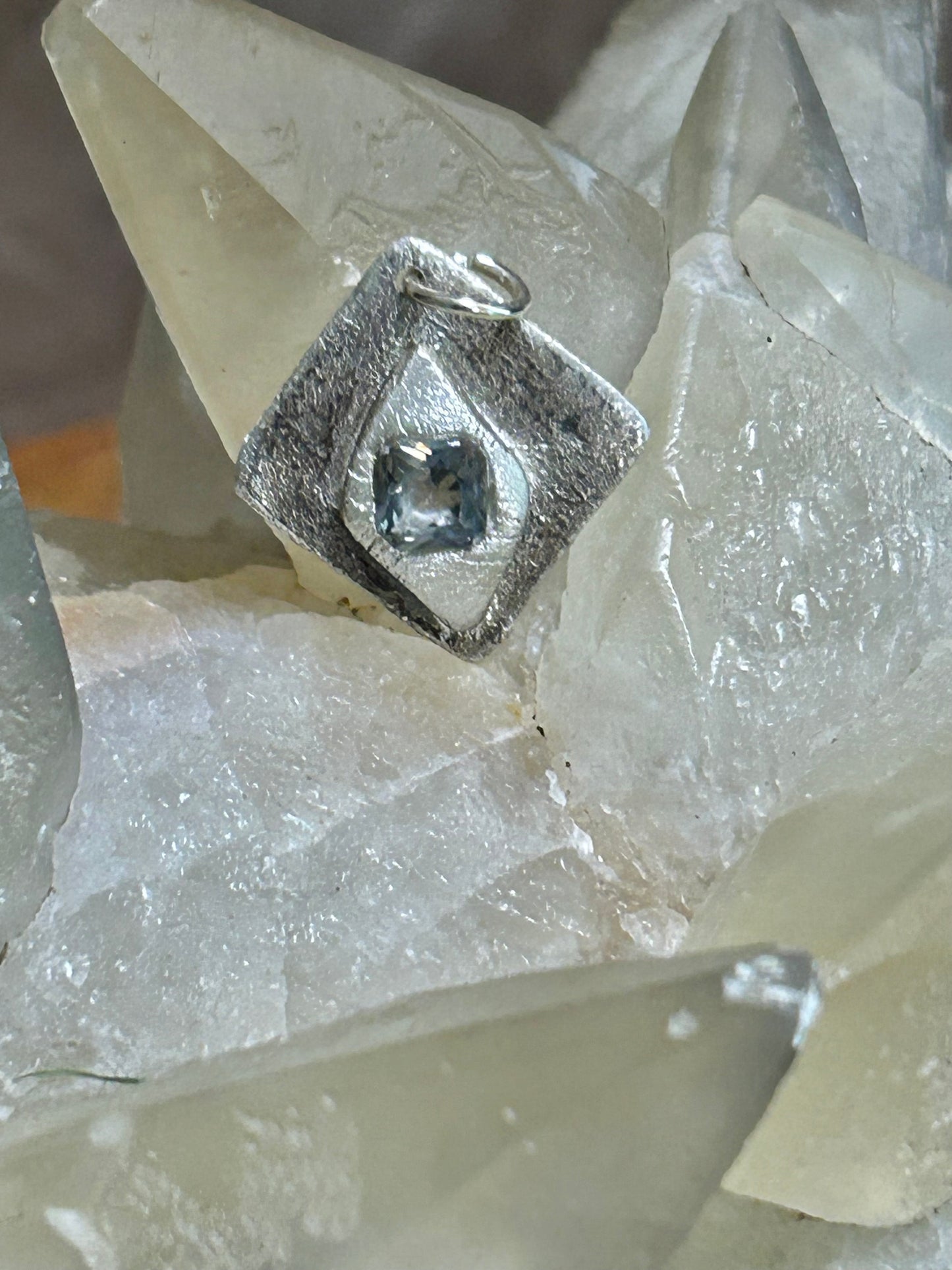 Fine Silver Pendant with Faceted Blue Stone
