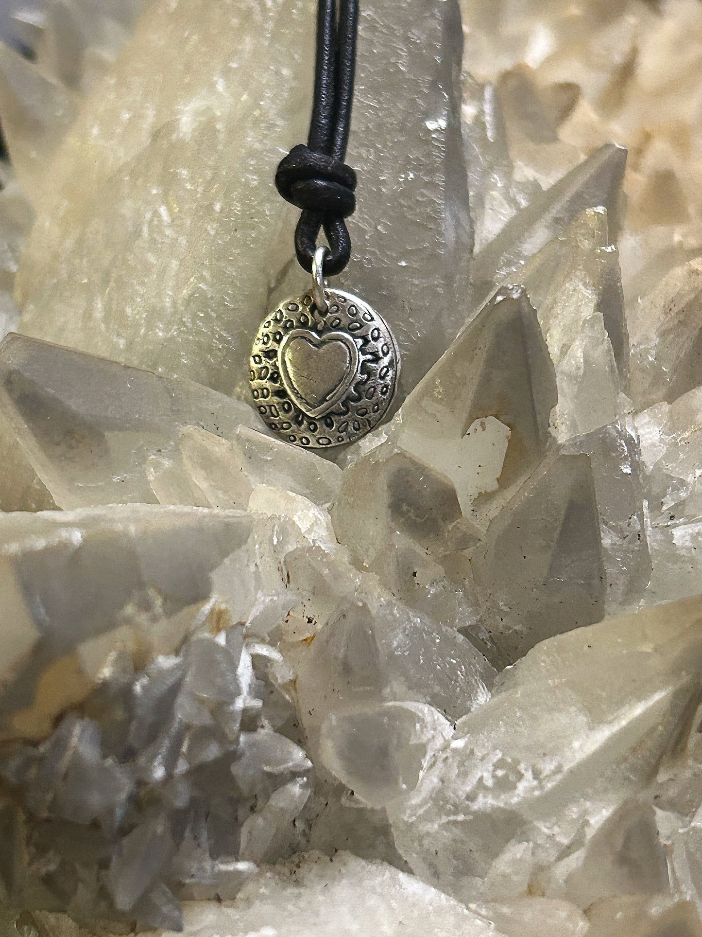 Leather necklace with fine silver heart